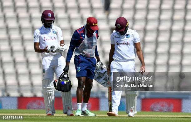 John Campbell of the West Indies leaves the field after injuring his toe during day five of the 1st #RaiseTheBat Test match at The Ageas Bowl on July...