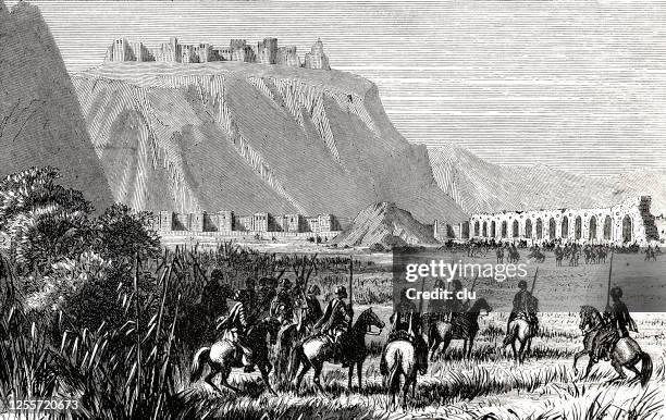 kurdische reiter vor einem dorf, suchen - kurdistan stock-grafiken, -clipart, -cartoons und -symbole