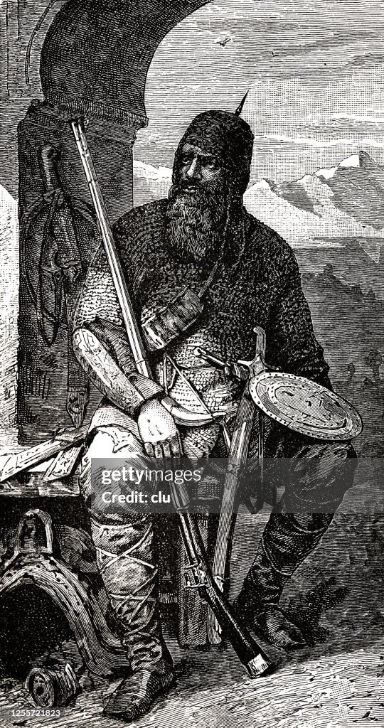 Warrior from Chechnya, sitting on a bench at a gate with rifle and sword