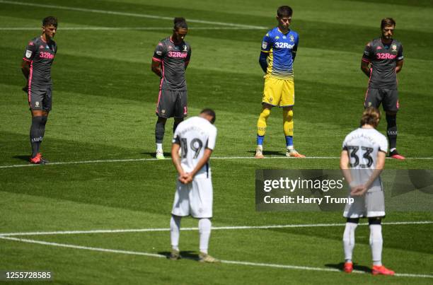 Minutes silence is held prior to kick off in memory of Jack Charlton during the Sky Bet Championship match between Swansea City and Leeds United at...