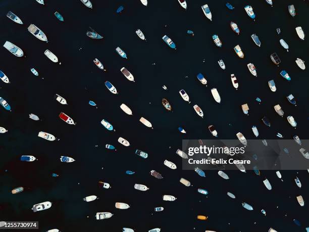 aerial top view pattern of anchored boats at the harbour. - anchor illustration stockfoto's en -beelden