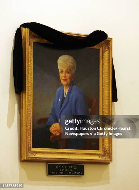 Black cloth hangs over the portrait of former Texas Governor Ann Richards during a memorial ceremony for the former governor in the rotunda at the...