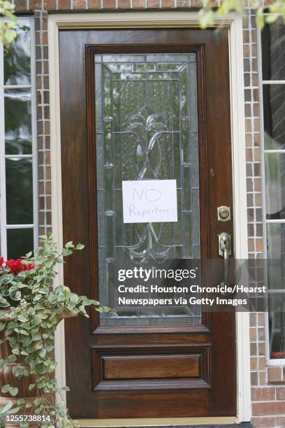 Sign on a door of a home on the street which NASA astronaut Lisa Nowak's home is located on in Houston, Texas February 7,2007. Nowak has been charge...