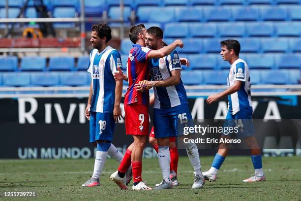 Segi Enrich of Eibar and David Lopez of RCD Espanyol embrace each other following the La Liga match between RCD Espanyol and SD Eibar SAD at RCDE...