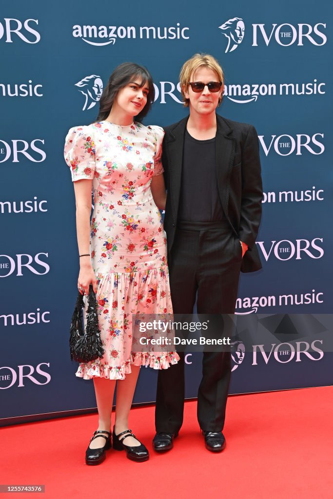 Georgie Somerville and Tom Odell attend The Ivors 2023 at The