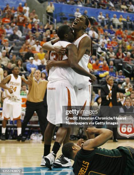 The University of Texas' Kevin Durant hugs teammate Craig Winder during the second half of Phillips 66 Big 12 Men's Basketball Championship...