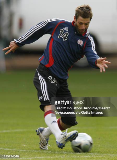 The New England Revolution's Steve Ralston kicks the ball during the team practice for the MLS Cup at RFK Stadium Saturday, Nov. 17 in Washington....