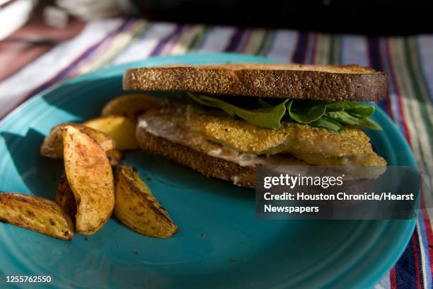 Fried Catfish Sandwich with Arugula and spicy mayonnaise cooked by the Houston Chronicle's Peggy Grodinsky Monday, June 9 in Houston.