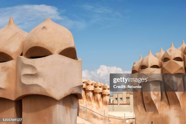 chimneys in casa milà - la pedrera stock pictures, royalty-free photos & images