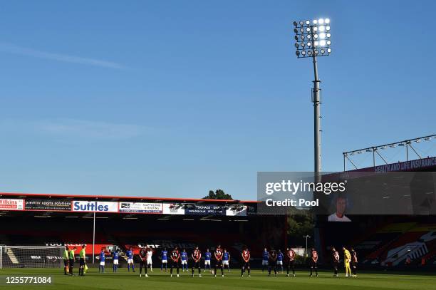 Players and officials take part in a minute of silence to pay tribute to Jack Charlton prior to during the Premier League match between AFC...