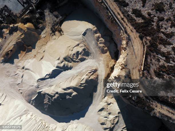 aerial view of a quarry. world at work drone view. - mining from above stock pictures, royalty-free photos & images