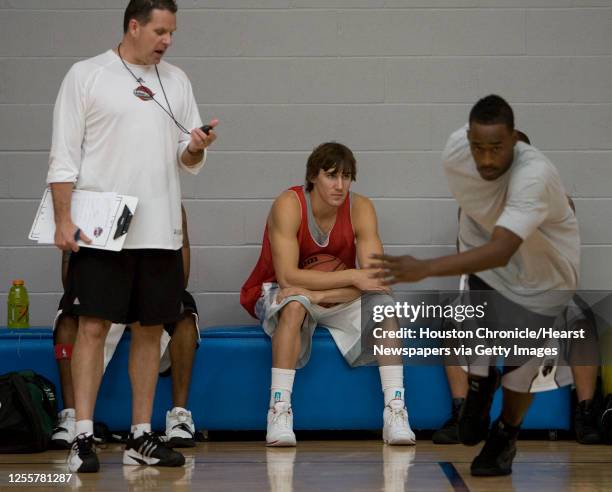 Head coach Clay Moser times Mario Kinsey as Thomas Sander looks on during tryouts for the Rio Grande Valley Vipers NBA D-League tryouts at Memorial...