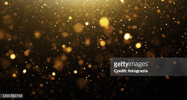 golden glittering background - messa a fuoco differenziale foto e immagini stock