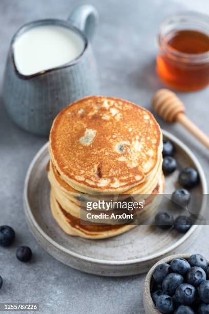 tasty pancakes with blueberries - american pancakes stock pictures, royalty-free photos & images