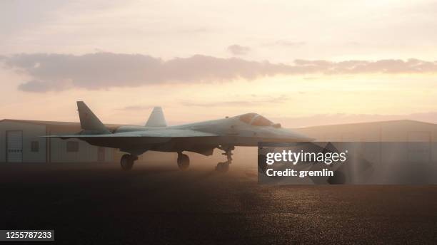 sukhoi su-57 chasseur à réaction furtif russe - base militaire photos et images de collection