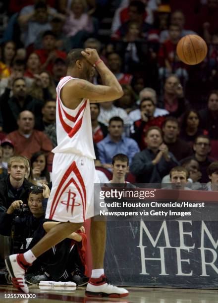 The Houston Rockets Tracy McGrady reacts after a goal tending call against him during the first quarter of NBA game action against the Washington...