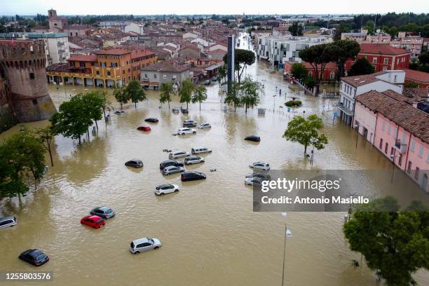 In this aerial picture, flooded streets caused by heavy rains across Italy's northern Emilia Romagna region, on May 18, 2023 in Lugo, Italy. Nine...