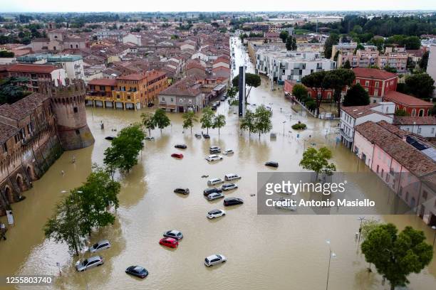 In this aerial picture, flooded streets caused by heavy rains across Italy's northern Emilia Romagna region, on May 18, 2023 in Lugo, Italy. Nine...
