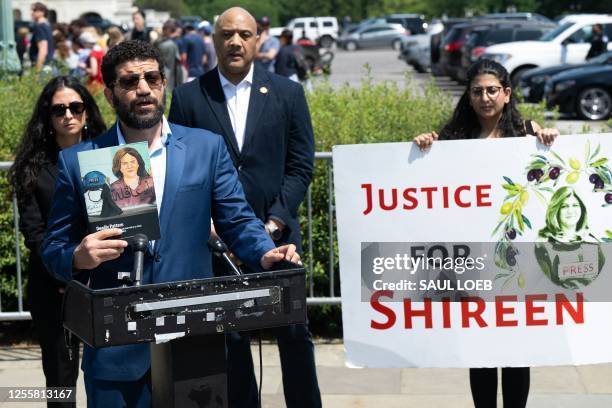 Sherif Mansour of the Committee to Protect Journalists, speaks alongside US Representative Andre Carson , Democrat of Indiana, during a press...