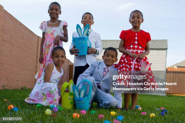 Javan Tate, Alisha Tate, Joshua Tate, Aaron Tate and Lauren Tate pose for an easter fashion shoot in Pearland.