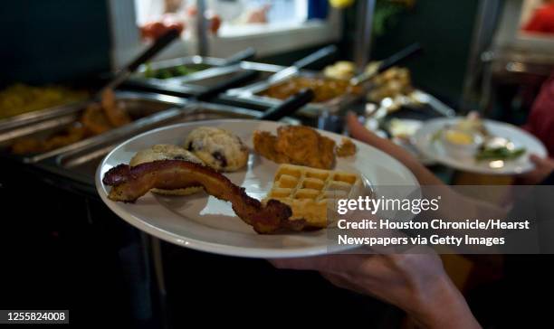 Plate with a few of the brunch items at the Dharma Cafe Sunday, May 17 in Houston.