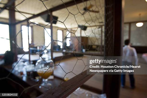 Chicken wire surrounds a serving area in the upstairs dance hall at Sengelmann Hall Wednesday, May 20 in Schulenburg.