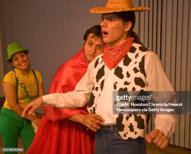 Diego Olalla as "Woody", Eddie Gonzalez as "Little Red Riding Hood", Maria Espinoza as "Cric" during theatre Teatro Indigo's production of "Erase una...