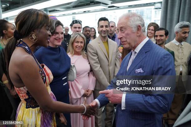 Britain's King Charles III speaks with television presenter and executive, June Sarpong the Queen Elizabeth II Award for British Design ceremony...