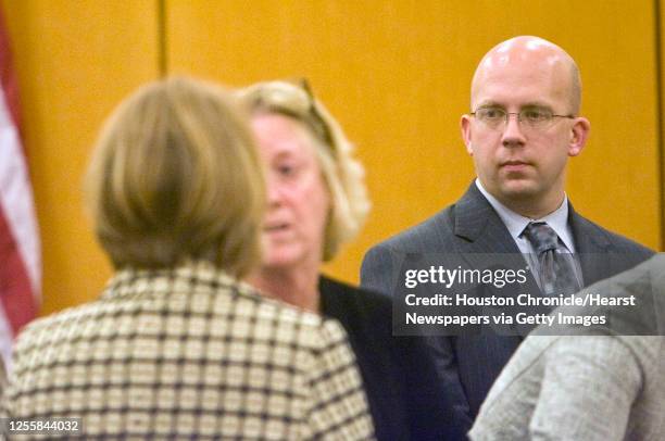 Benjamin Thompson looks towards his estranged wife Abigail Young during a court hearing on the death of their four-year-old daughter Emma Thompson in...