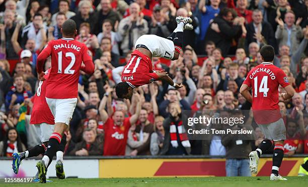 Nani of Manchester United celebrates scoring their second goal during the Barclays Premier League match between Manchester United and Chelsea at Old...