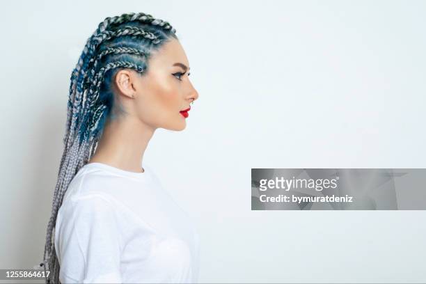 young woman standing and looking - cornrows stock pictures, royalty-free photos & images