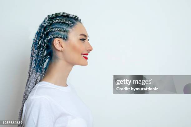 young woman standing and looking - cornrows stock pictures, royalty-free photos & images