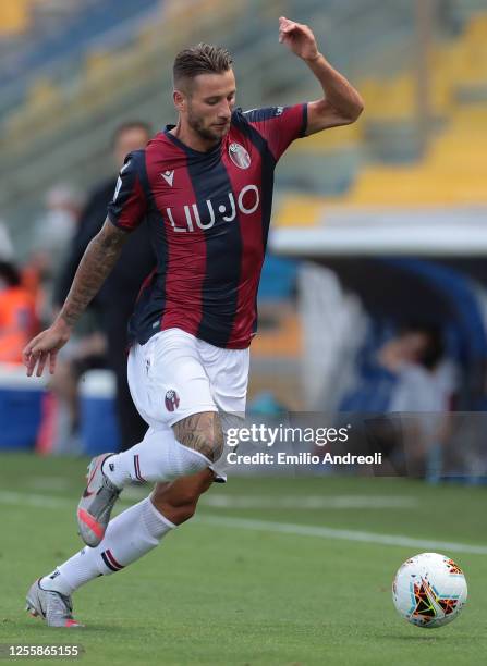 Mitchell Dijks of Bologna FC in action during the Serie A match between Parma Calcio and Bologna FC at Stadio Ennio Tardini on July 12, 2020 in...