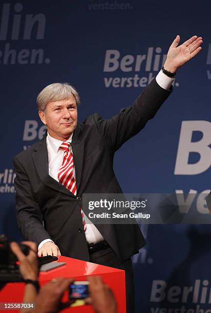 Berlin Mayor and incumbent candidate of the German Social Democrats Klaus Wowereit celebrates at an SPD election-night gathering after initial exit...