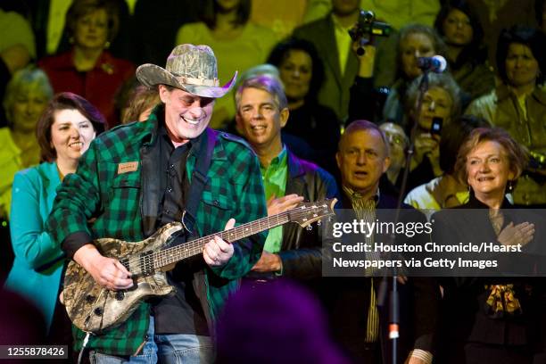 Ted Nugent plays the national anthem at a political where Former Alaska Governor Sarah Palin endorses Texas Governor Rick Perry reelection campaign...