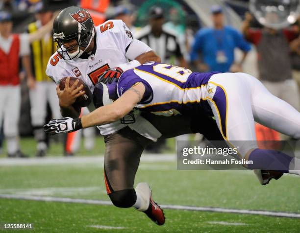 Jared Allen of the Minnesota Vikings sacks Josh Freeman of the Tampa Bay Buccaneers in the first quarter on September 18, 2011 at the Hubert H....