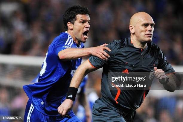 Michael Ballack of Chelsea protests to referee Tom Henning Ovrebo during the UEFA Champions League semi final second leg match between Chelsea and...