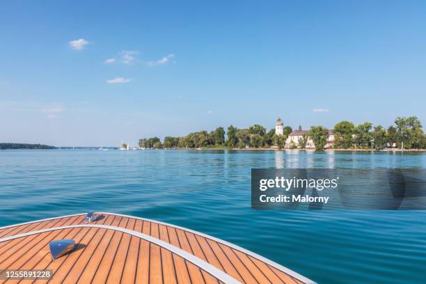 fraueninsel at lake chiemsee seen from a boat or yacht. - boat deck background stock pictures, royalty-free photos & images