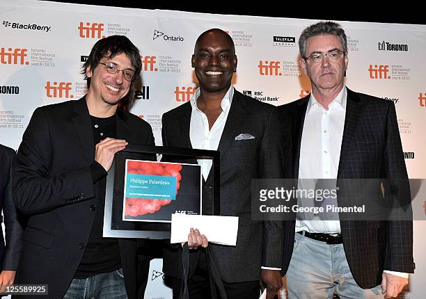 Writer/Director Philippe Falardeau, Co-Director of TIFF Cameron Bailey and CEO of TIFF Piers Handling pose onstage at the Cadillac People's Choice...