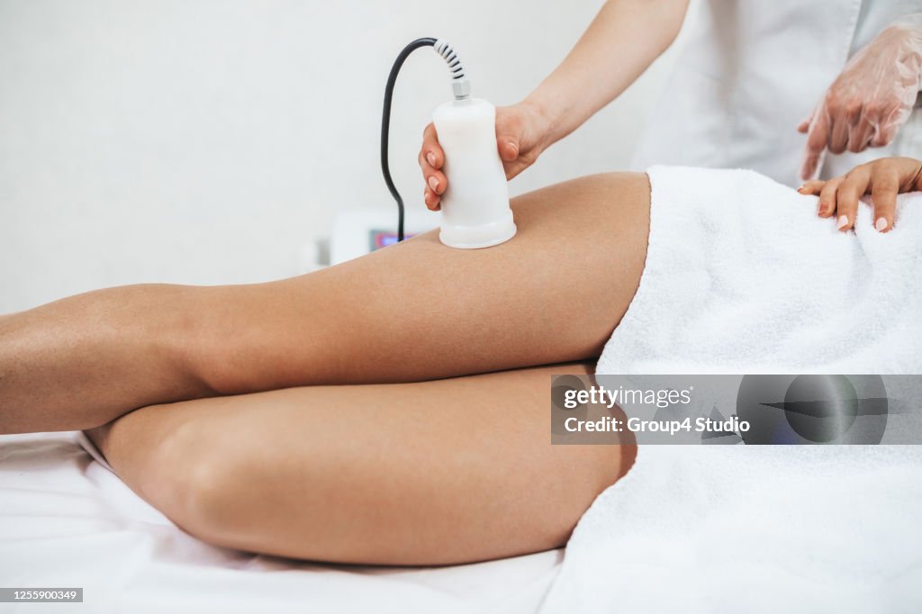 Beautiful young adult woman at medical and beauty treatment
