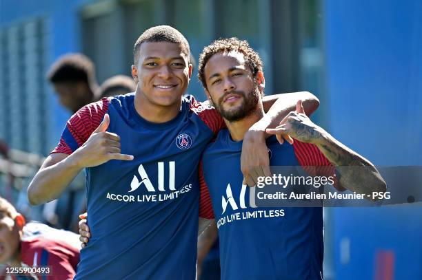 Kylian Mbappe and Neymar Jr pose together before a Paris Saint-Germain training session at Ooredoo Center on July 13, 2020 in Paris, France.