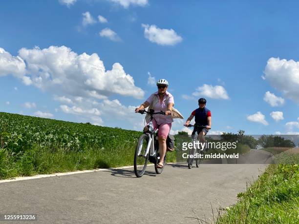 cycling in the country - limburg netherlands stock pictures, royalty-free photos & images