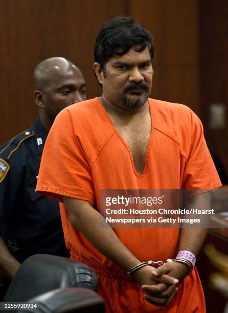 Vijay Kumar exits the court room after pleading no contest to carrying brass knuckles in his checked airline baggage in Judge David Mendoza's 178th...