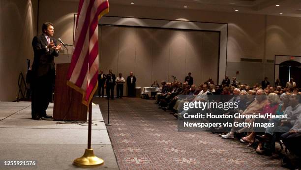 Texas Governor Rick Perry speaks during the Texas Conservative Coalition and Empower Texas "Tenth Amendment Town Hall Meeting" at the Humble Civic...