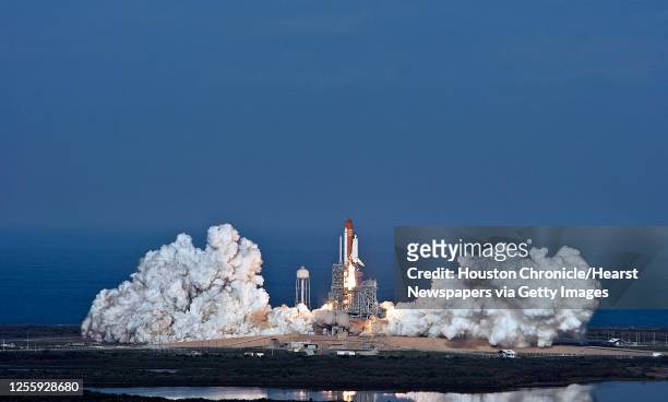 Space shuttle Discovery launches from pad 39A for the STS-133 International Space Station mission and Discovery's final mission at NASA's Kennedy...