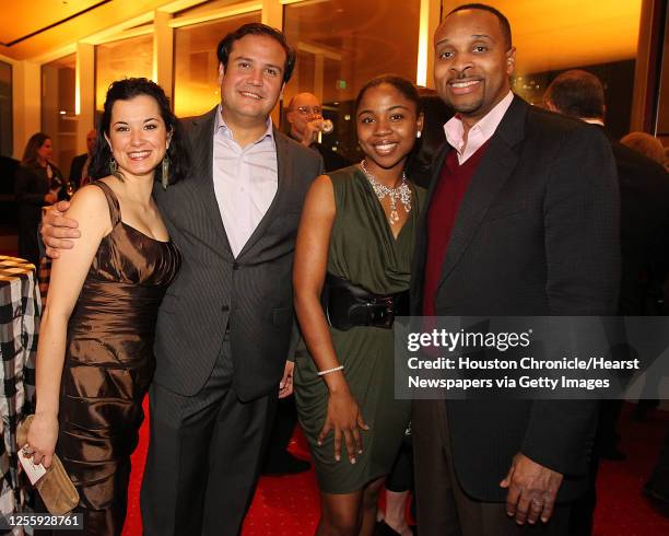 Geovanna Burgess left, Oscar Aguilar, Tonisha Alexander and Monsterville Horton, IV right, during the Social Book fundraising event at the Hobby...