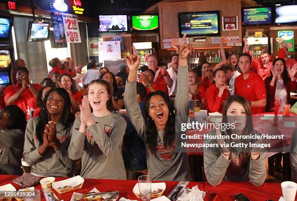 The University of Houston women's basketball team's left to right, Zalika Dyson, Breana Williams and Mae Woods watch the NCAA tournament selection on...