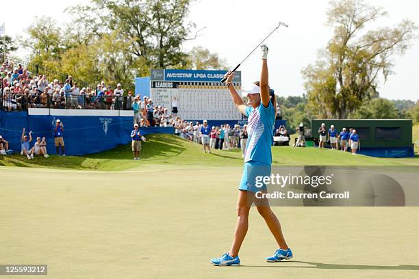 Lexi Thompsoncelebrates her victory at the 18th hole during the final round of the Navistar LPGA Classic at the Robert Trent Jones Golf Trail's...