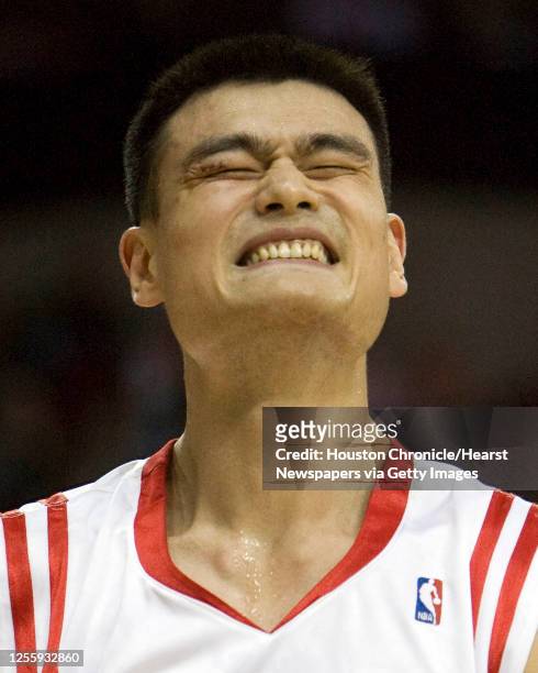The Houston Rockets Yao Ming winces after a play against the Indiana Pacers during the second quarter of NBA game action at the Toyota Center...