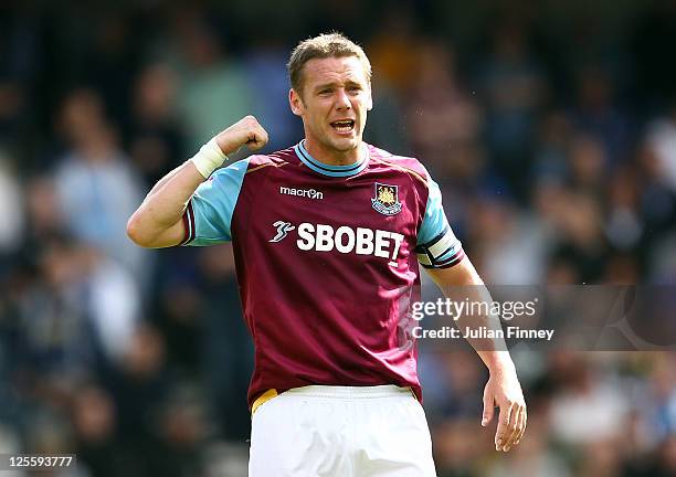 Kevin Nolan of West Ham United gives instructions during the npower Championship match between Millwall and West Ham United at The Den on September...